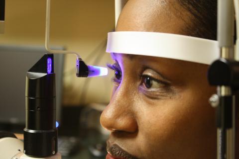 A woman having an eye exam.