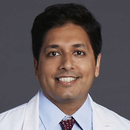 a headshot of Dr. Masurkar