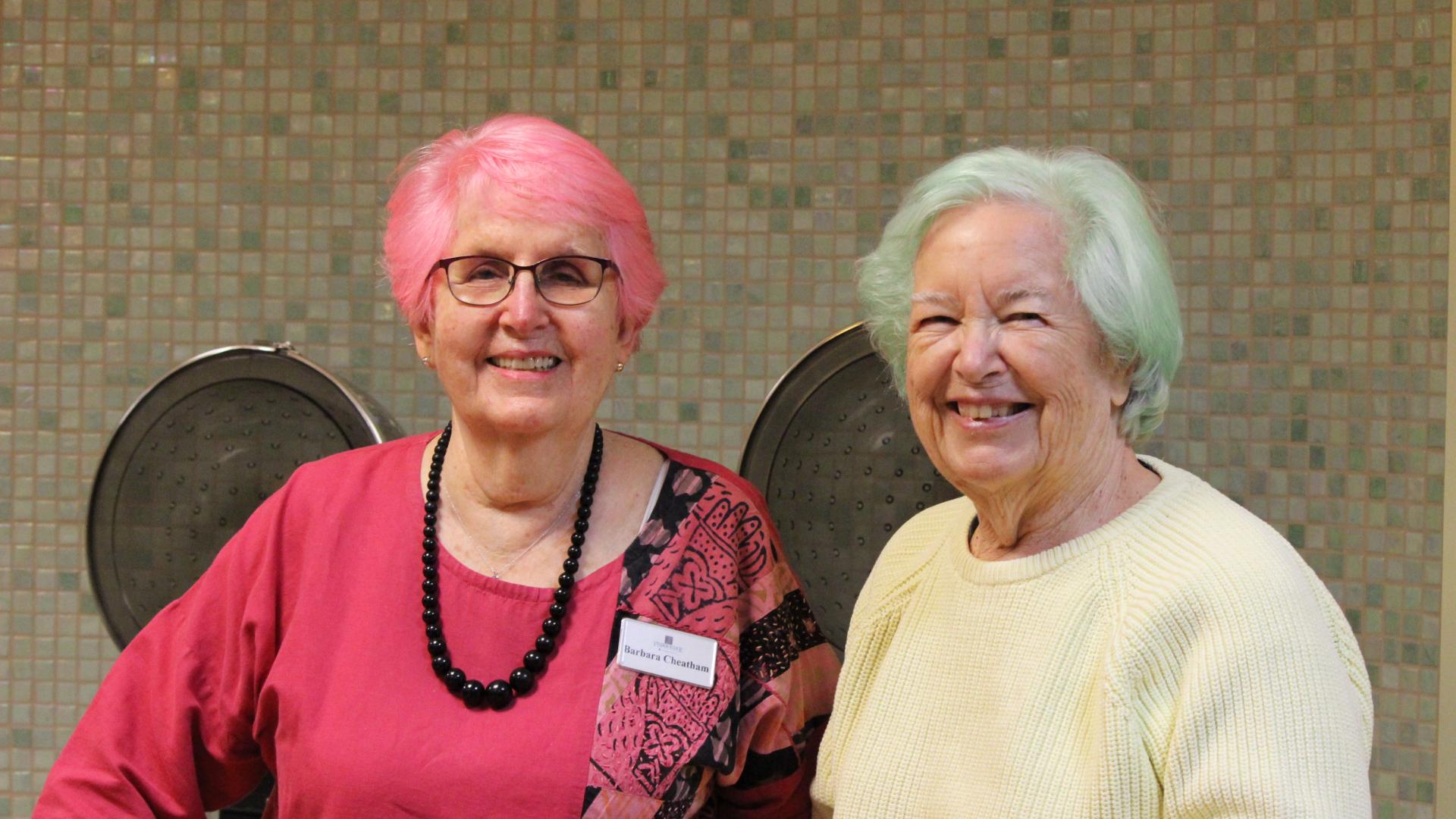 Barbara Cheatham (left) and Martha Martin, members of the low-vision support group at Timber Ridge at Talus Life Services Community in Issaquah, Washington.