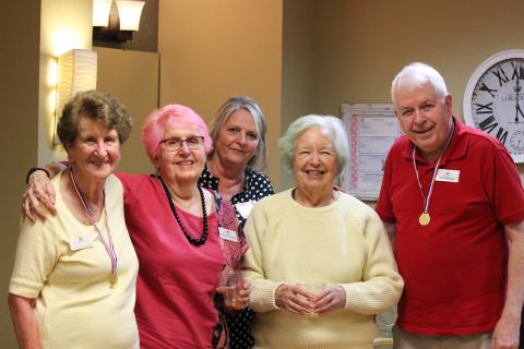 A group of residents and staff at Timber Ridge at Talus Life Services Community in Issaquah, Washington.