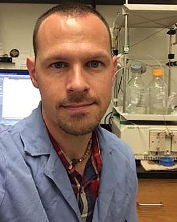 Paul Seidler, PhD, working in a lab.