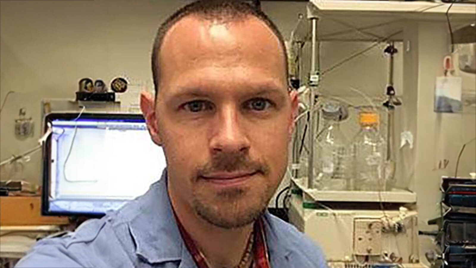 Paul Seidler, PhD, working in a lab.