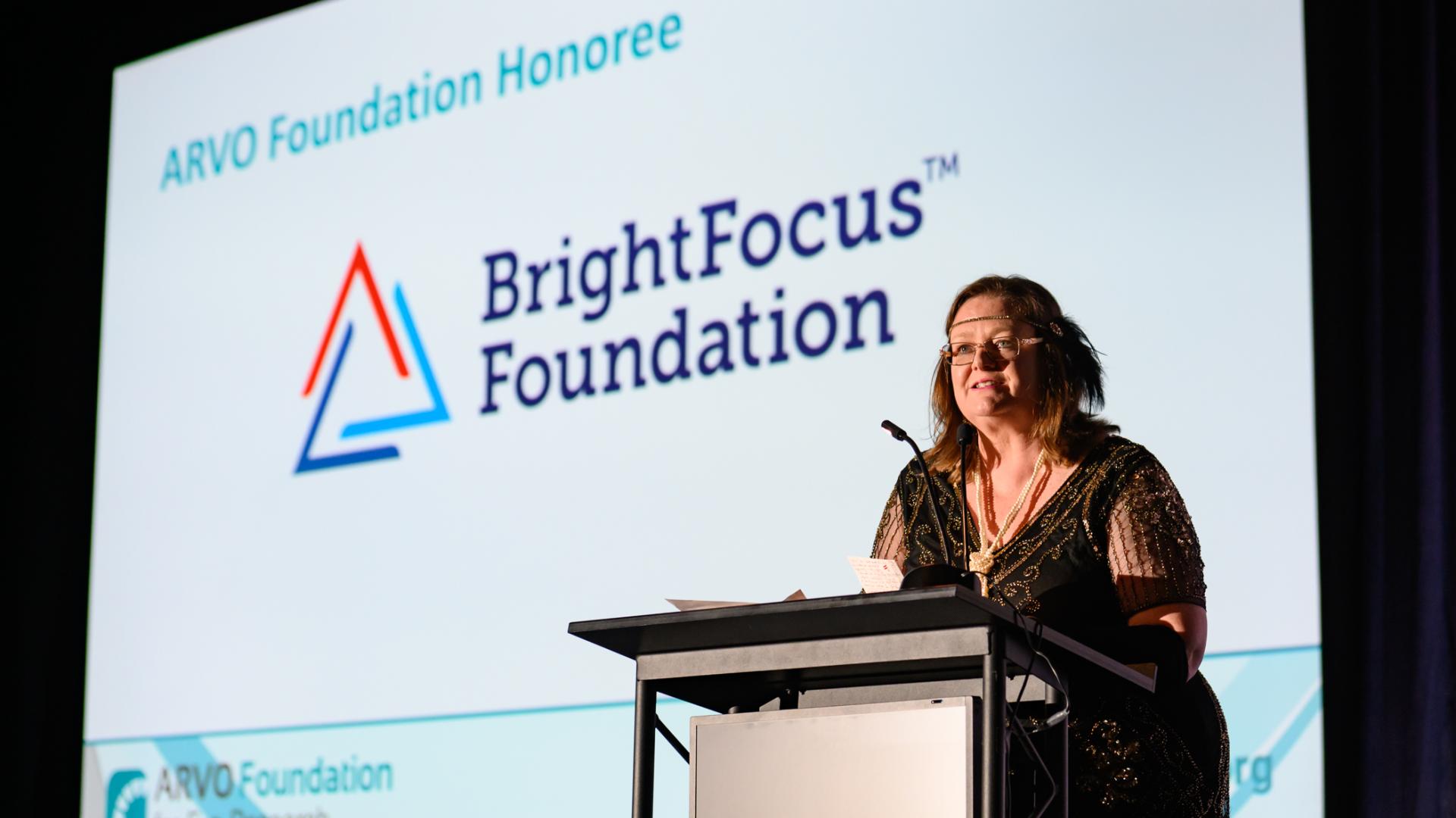 Diane Bovenkamp, PhD, accepting the award on behalf of BrightFocus Foundation at the ARVO Foundation Gala.