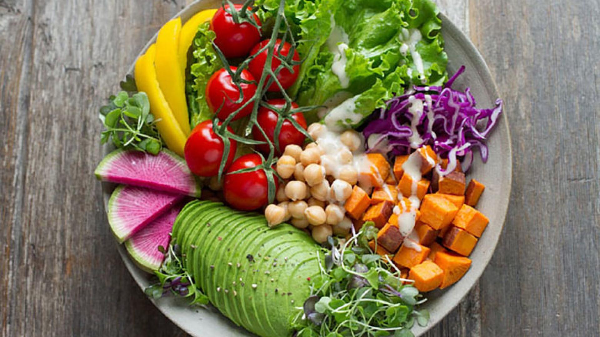 A bowl of vibrant vegetables.