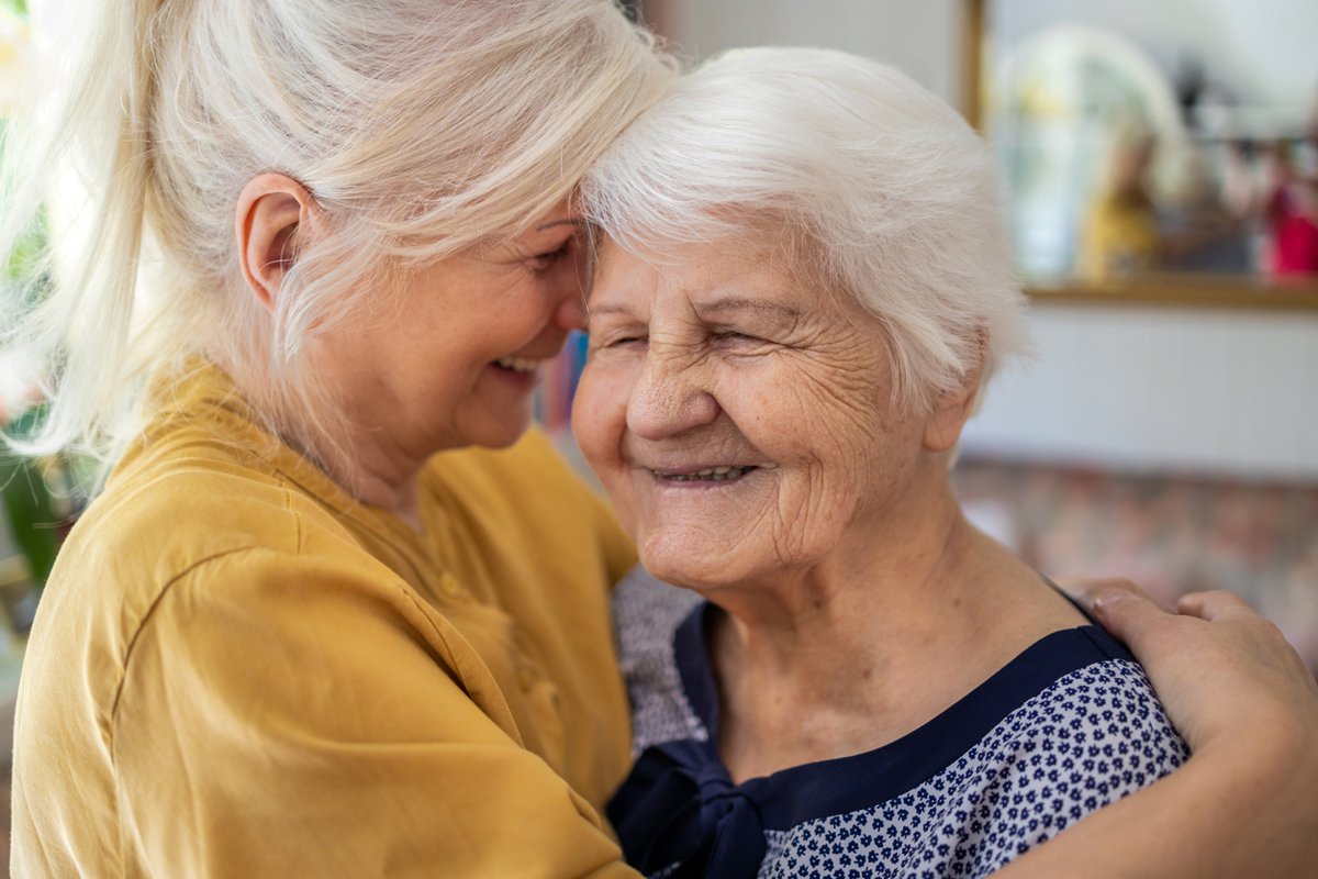 Daughter hugs her mother