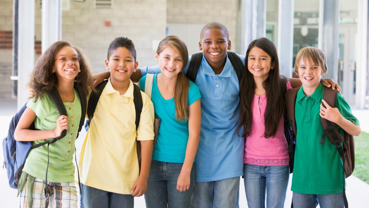 A group of school children.