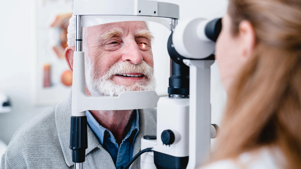 Generate by AI Assist An eye doctor conducting an eye examination on a smiling elderly patient using specialized equipment.