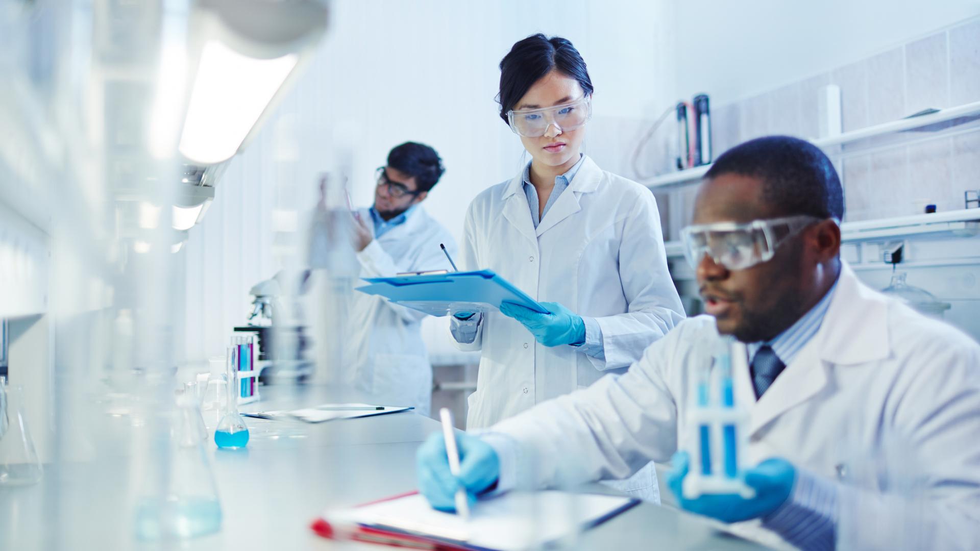 Researchers working in lab.