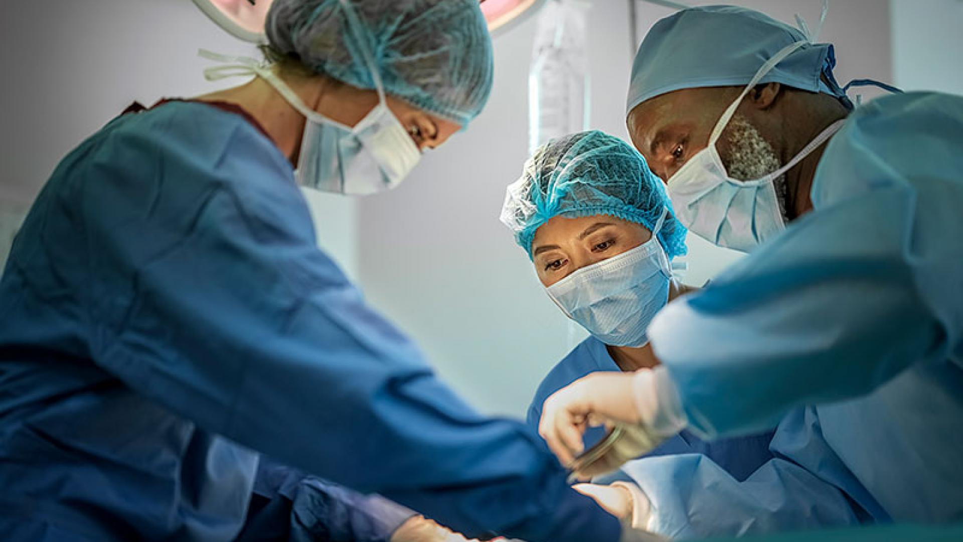 Surgeons performing an operation.