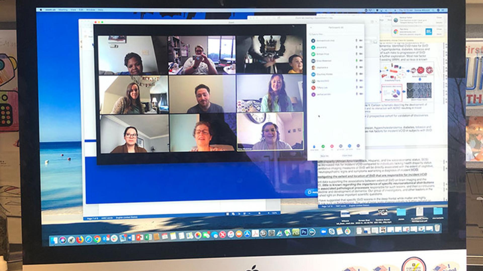 A computer screen shot showing Donna M. Wilcock, PhD and her team during a Zoom meeting.