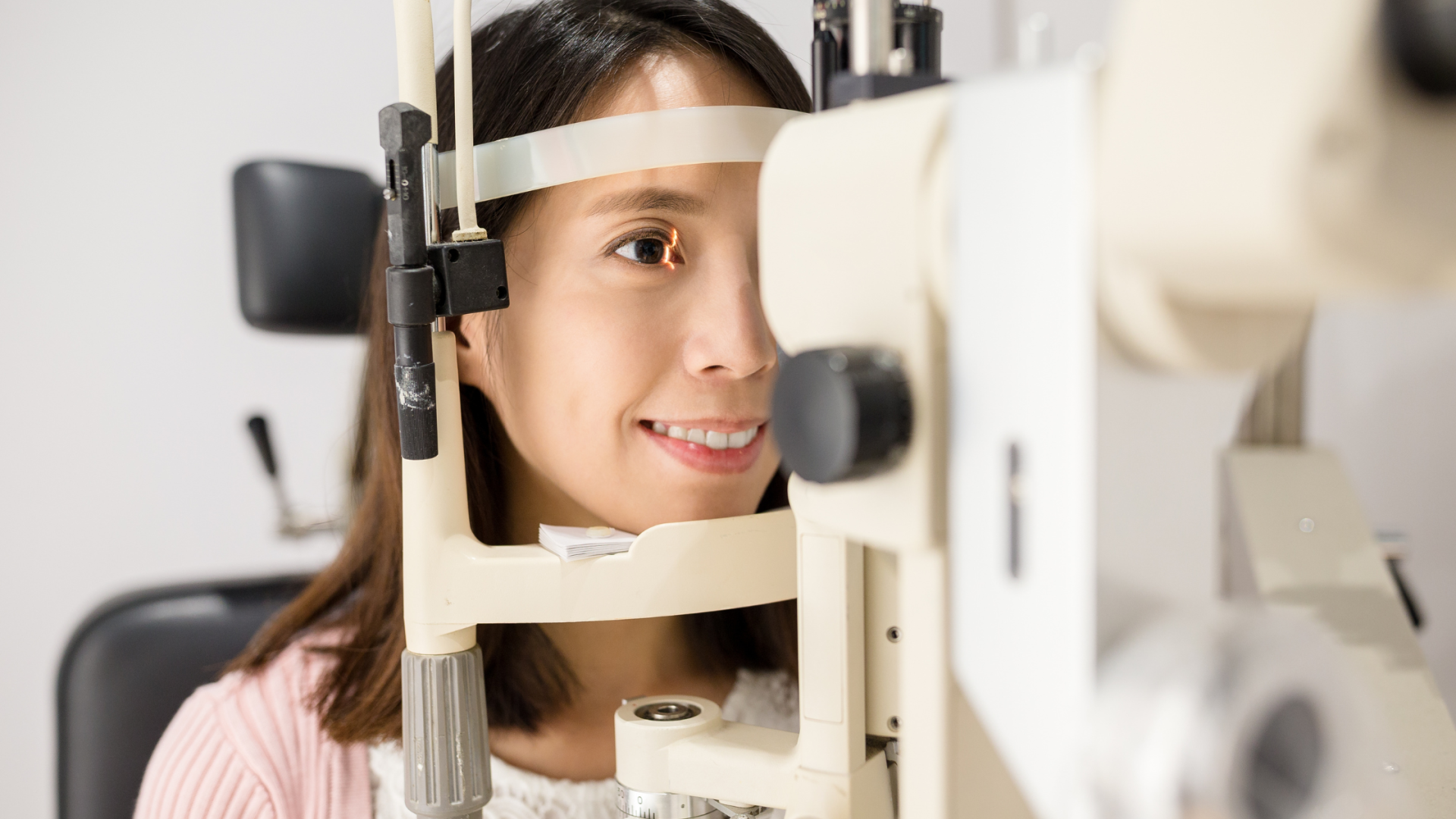 Woman receiving an eye exam