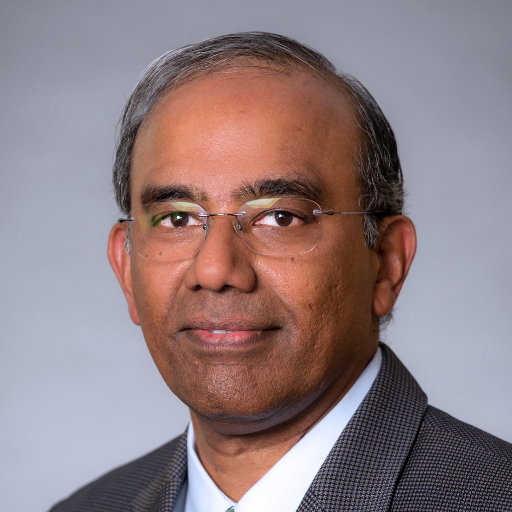 a headshot of Dr. Thinakaran