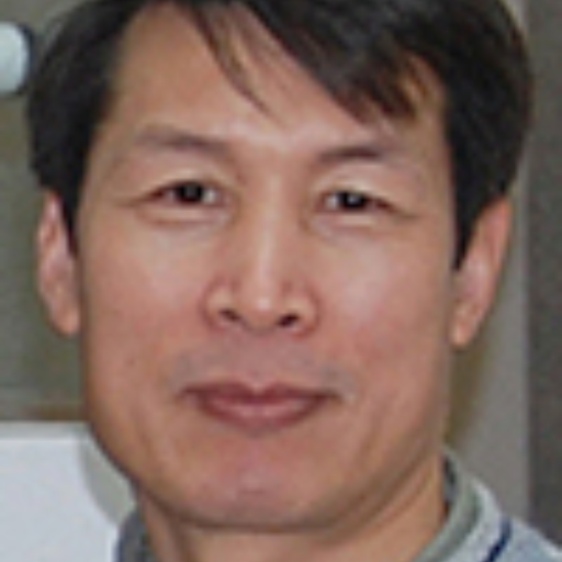 a headshot of Dr. Wang