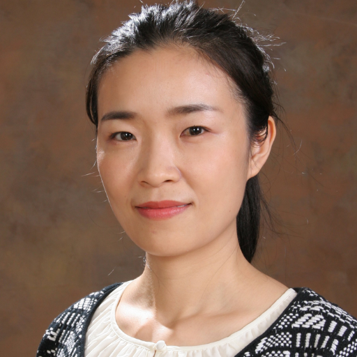 a headshot of Dr. Wang