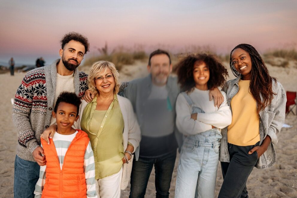 A smiling family on the beach