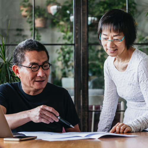 Senior couple does their taxes together.