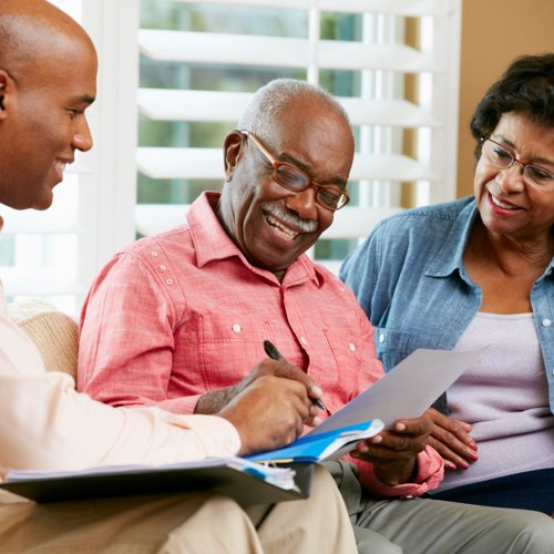 A couple meets with a financial advisor.