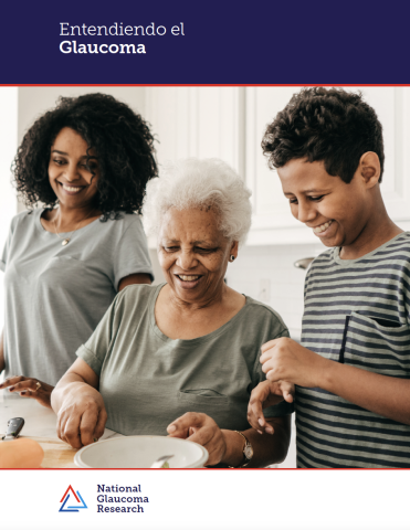 Three generations of a family smile as they prepare a meal together on the cover of Understanding Glaucoma brochure.