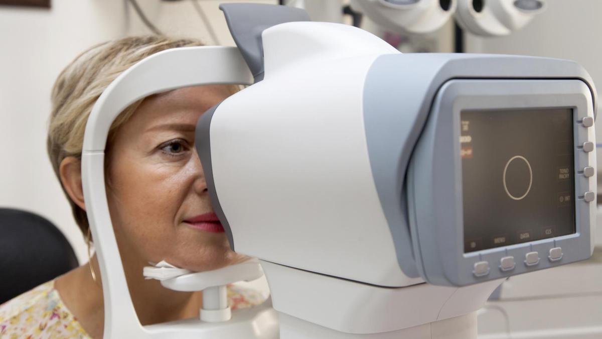 A woman receives an eye test for glaucoma.