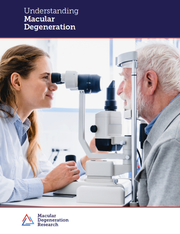 Cover of Understanding Macular Degeneration brochure featuring an eye doctor conducting an eye exam with a older patient.