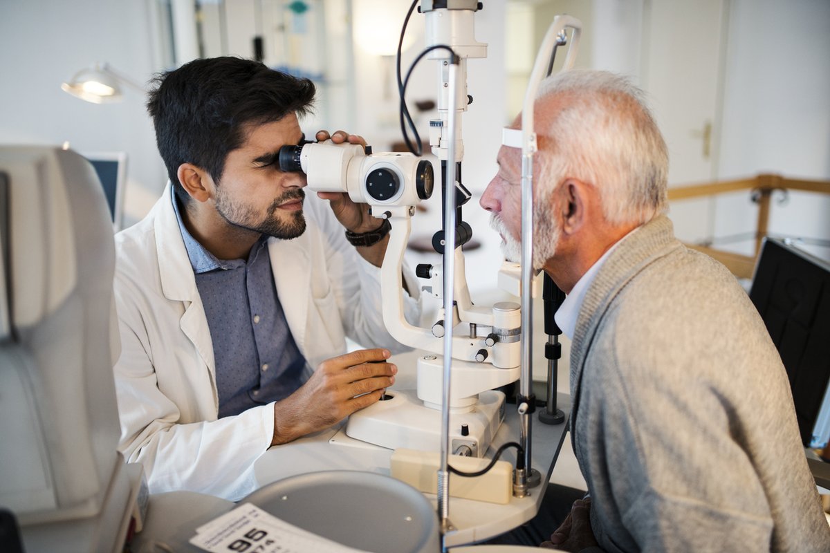 Man getting his eyes checked by an ophthalmologist.