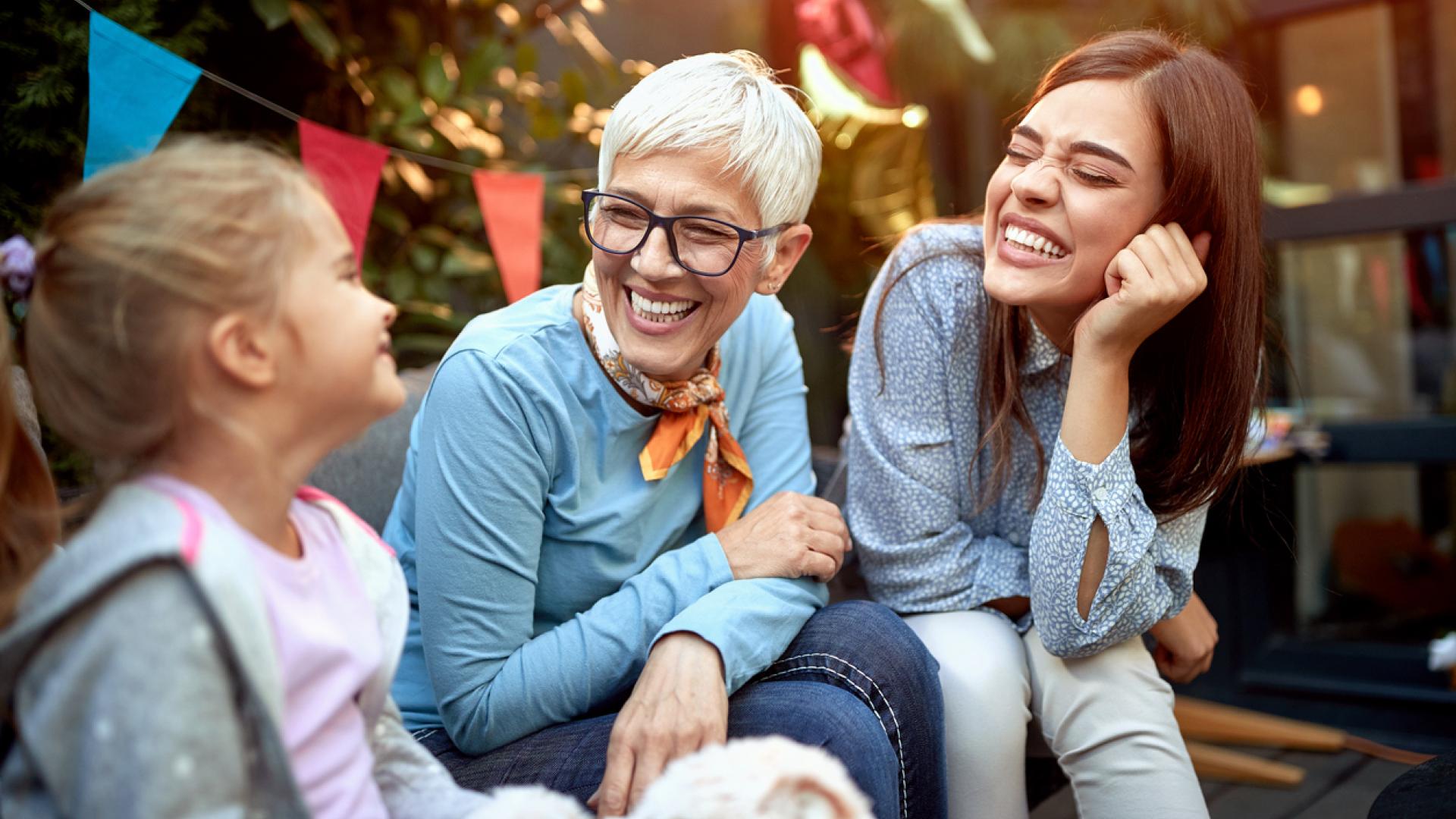 Sweet little girl with her mother and grandmother.